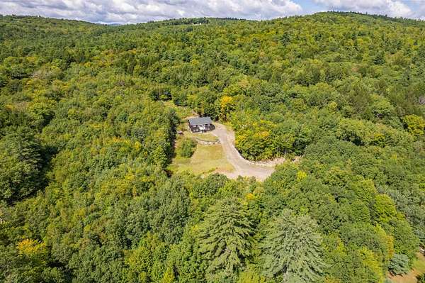8 Acres of Land with Home for Sale in Bristol, New Hampshire