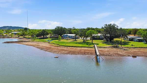 1.65 Acres of Land with Home for Sale in Graford, Texas