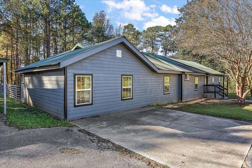 2.65 Acres of Land with Home for Sale in Shelbyville, Texas