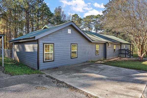 2.65 Acres of Land with Home for Sale in Shelbyville, Texas
