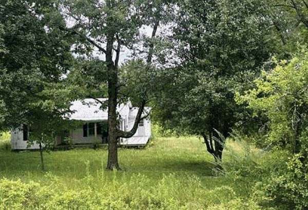 2.23 Acres of Land with Home for Auction in Sparta, Tennessee