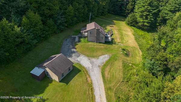 33.8 Acres of Agricultural Land with Home for Sale in Wyoming, Pennsylvania