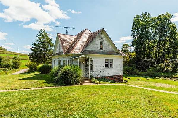 3.2 Acres of Land with Home for Auction in Stone Creek, Ohio