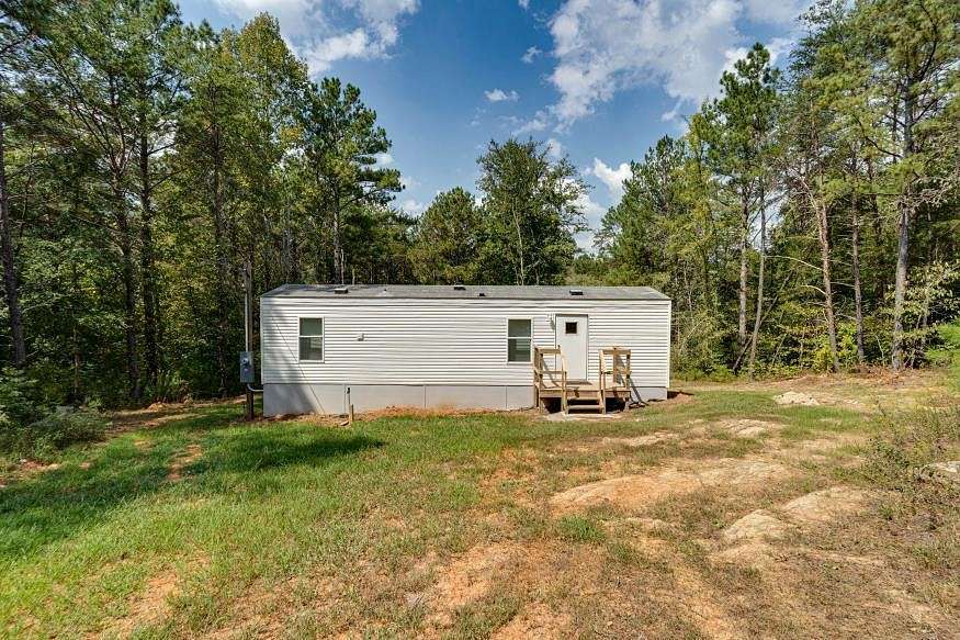 5 Acres of Land with Home for Sale in Oldfort, Tennessee