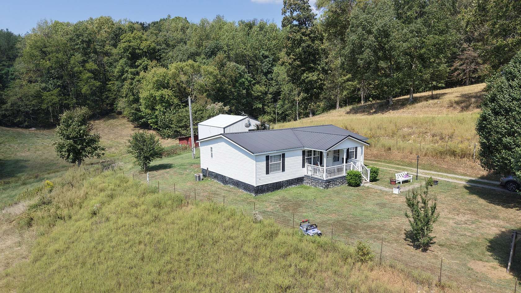 9.4 Acres of Land with Home for Sale in Westmoreland, Tennessee