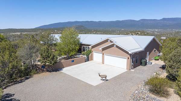 2 Acres of Land with Home for Sale in Sandia Park, New Mexico