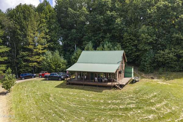 7.5 Acres of Land with Home for Sale in Mountain City, Tennessee