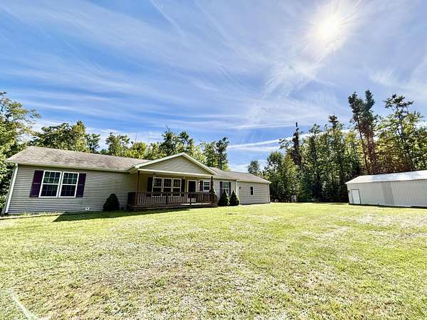 10 Acres of Land with Home for Sale in Atlanta, Michigan
