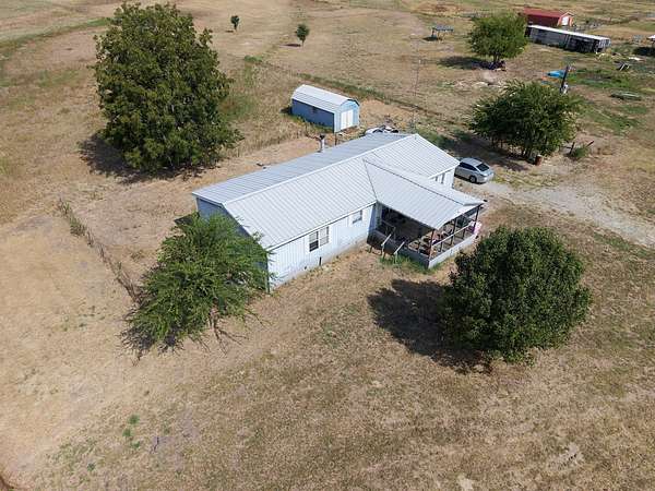 5 Acres of Land with Home for Sale in Terrell, Texas