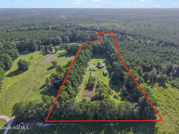 6.88 Acres of Land with Home for Sale in Bolivia, North Carolina