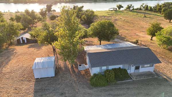 7.37 Acres of Land with Home for Sale in Marble Falls, Texas