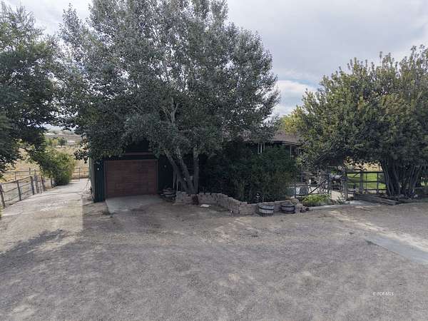 5 Acres of Land with Home for Sale in Spring Creek, Nevada
