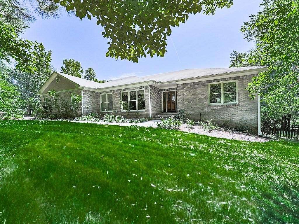 9 Acres of Land with Home for Sale in Dallas, Georgia