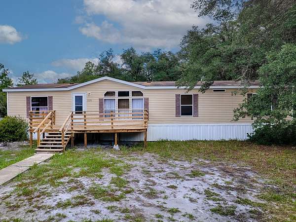 3.48 Acres of Land with Home for Sale in Fort McCoy, Florida