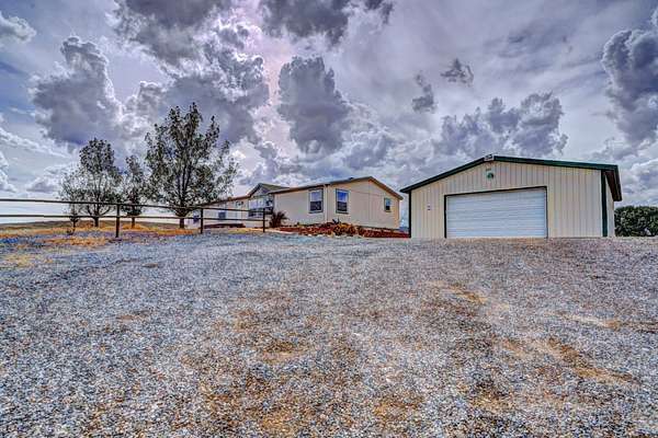 1.79 Acres of Land with Home for Sale in Grand Junction, Colorado