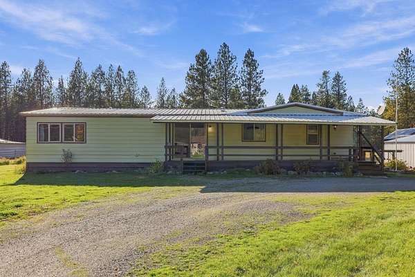 2.77 Acres of Land with Home for Sale in Colbert, Washington