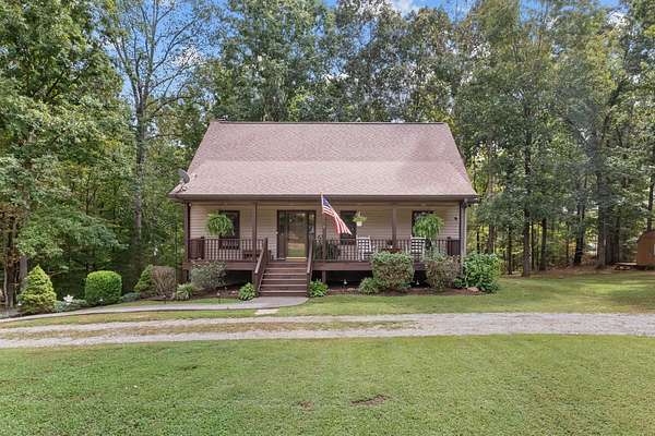 5.12 Acres of Land with Home for Sale in Pegram, Tennessee