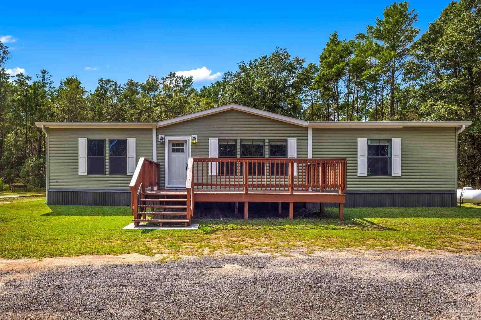 5.67 Acres of Land with Home for Sale in Milton, Florida