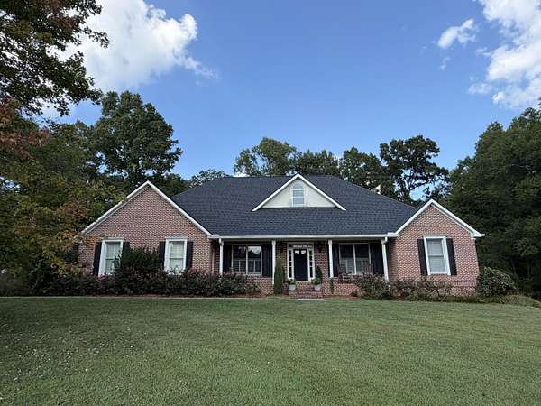 1.64 Acres of Land with Home for Sale in McDonald, Tennessee