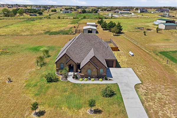 5 Acres of Land with Home for Sale in Rhome, Texas