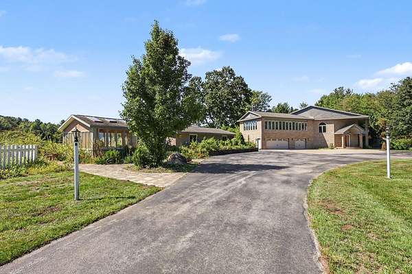 166 Acres of Recreational Land with Home for Sale in Fruitport, Michigan