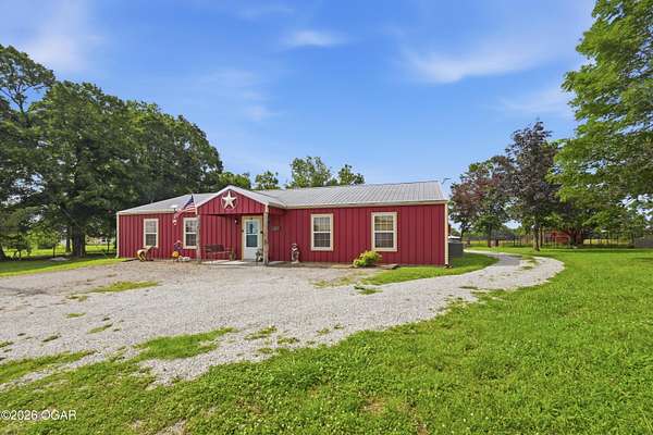 20.6 Acres of Land with Home for Sale in Carthage, Missouri