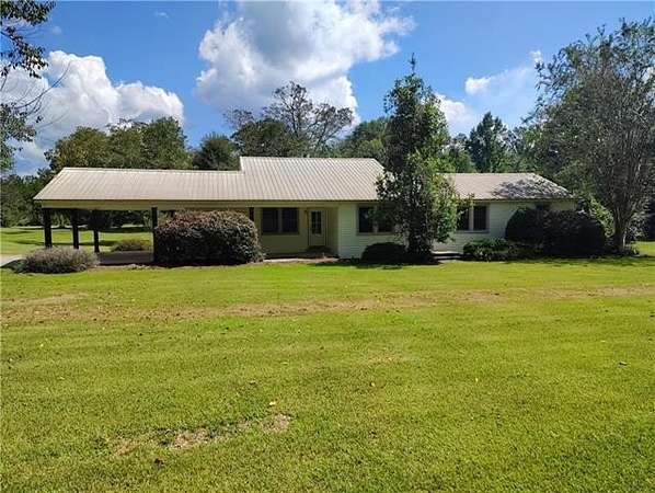 16.9 Acres of Recreational Land with Home for Sale in Bogalusa, Louisiana