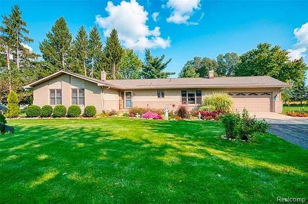1.7 Acres of Land with Home for Sale in Handy Township, Michigan