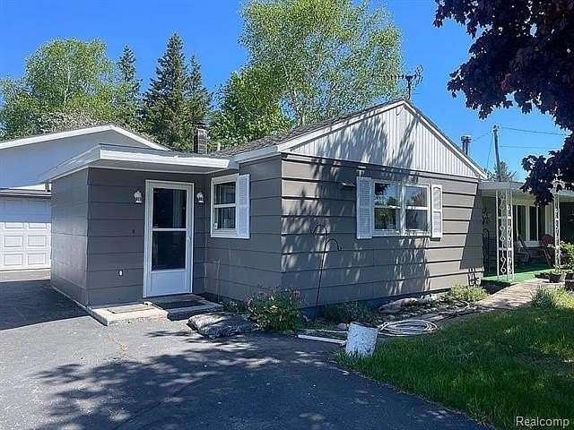 10 Acres of Land with Home for Sale in Inwood Township, Michigan