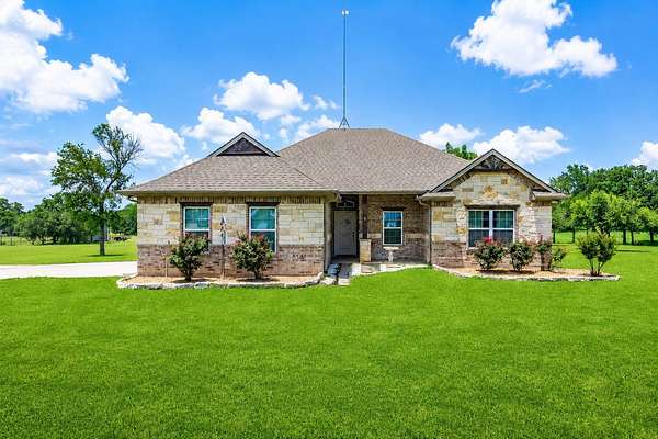 5.72 Acres of Land with Home for Sale in Scurry, Texas