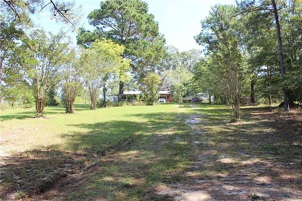 20.3 Acres of Land with Home for Sale in Phenix City, Alabama