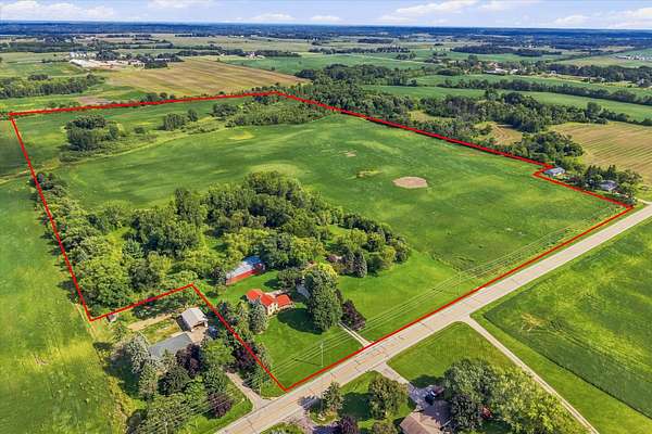 64 Acres of Land with Home for Sale in Caledonia, Wisconsin