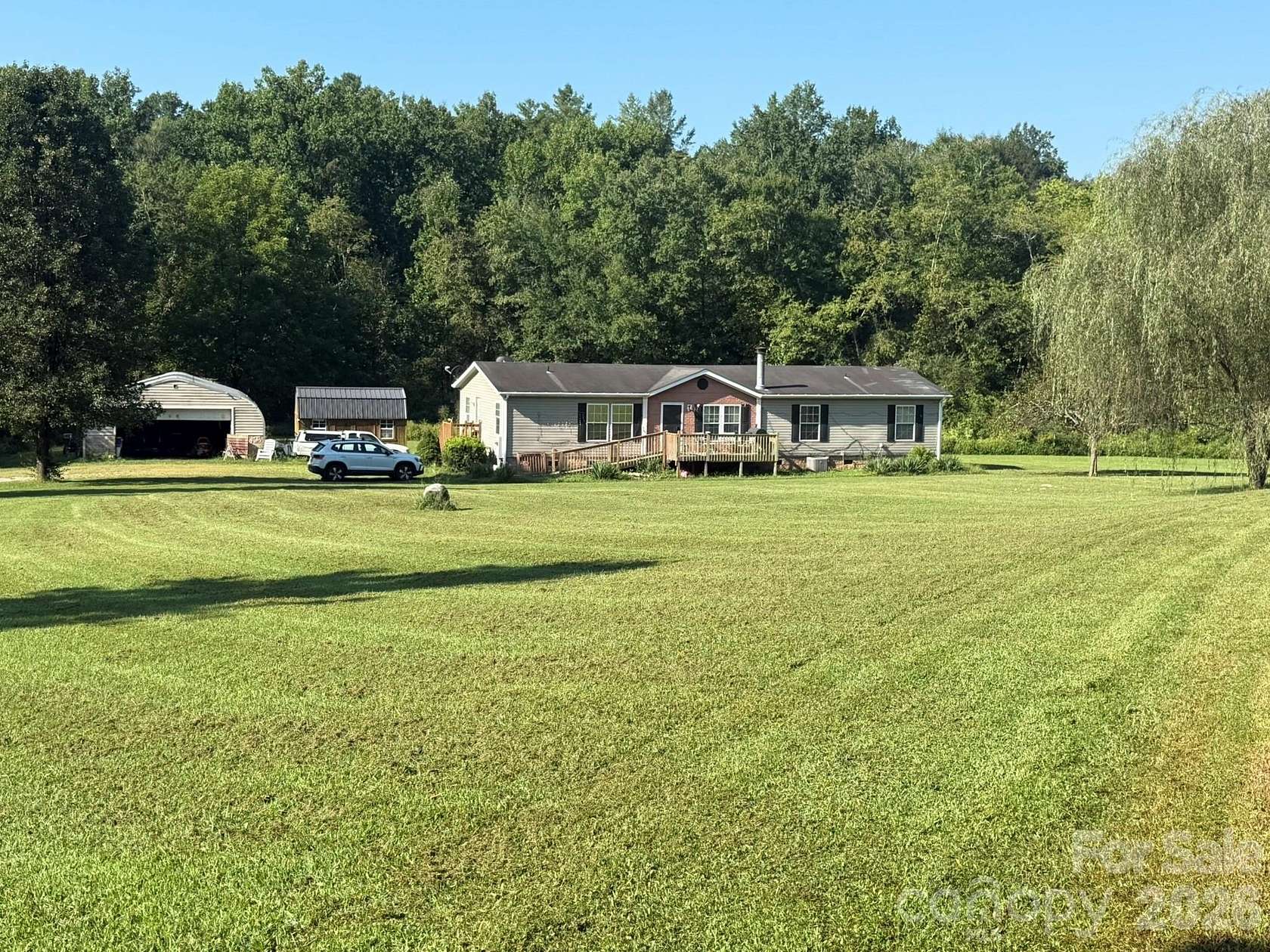 3.77 Acres of Land with Home for Sale in Marion, North Carolina