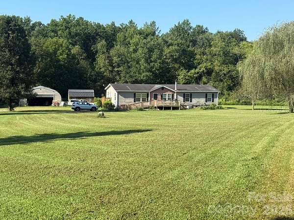 3.77 Acres of Land with Home for Sale in Marion, North Carolina