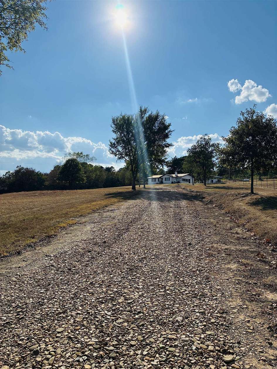 13.8 Acres of Land with Home for Sale in Magazine, Arkansas