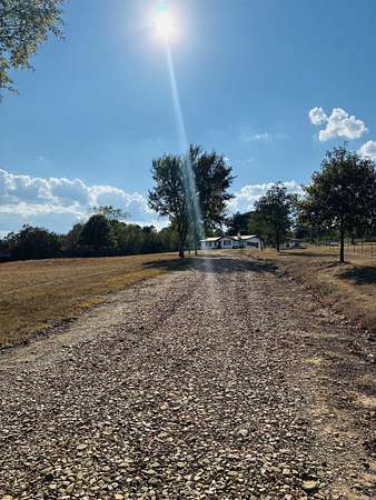 13.8 Acres of Land with Home for Sale in Magazine, Arkansas