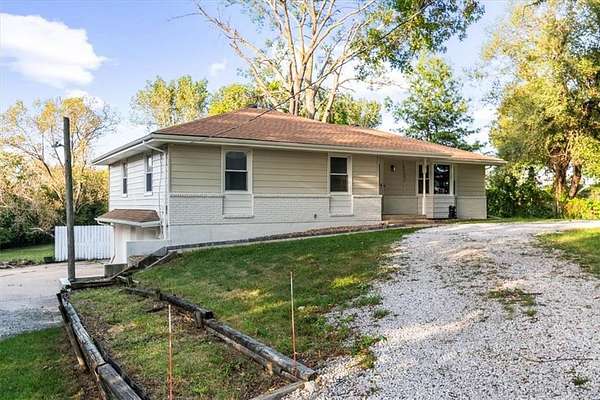 1.79 Acres of Land with Home for Sale in Blue Springs, Missouri