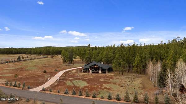 2.39 Acres of Land with Home for Sale in Munds Park, Arizona