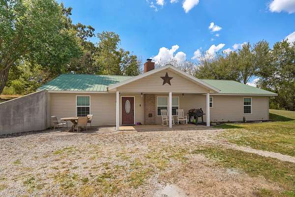 3.5 Acres of Land with Home for Sale in Crane, Missouri