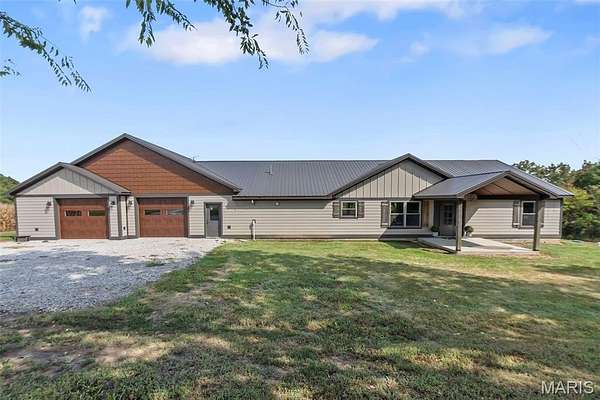 25 Acres of Land with Home for Sale in Perryville, Missouri