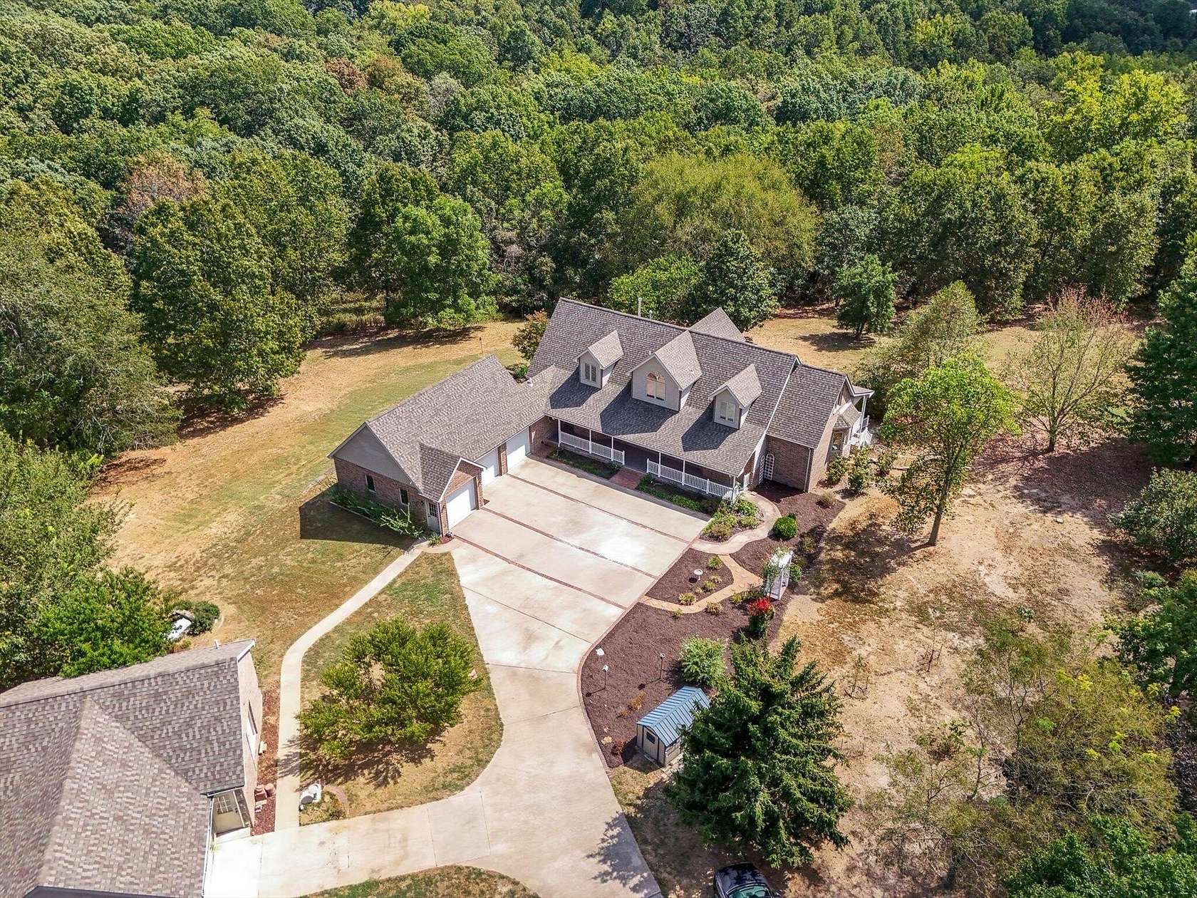 11.3 Acres of Land with Home for Sale in Nixa, Missouri