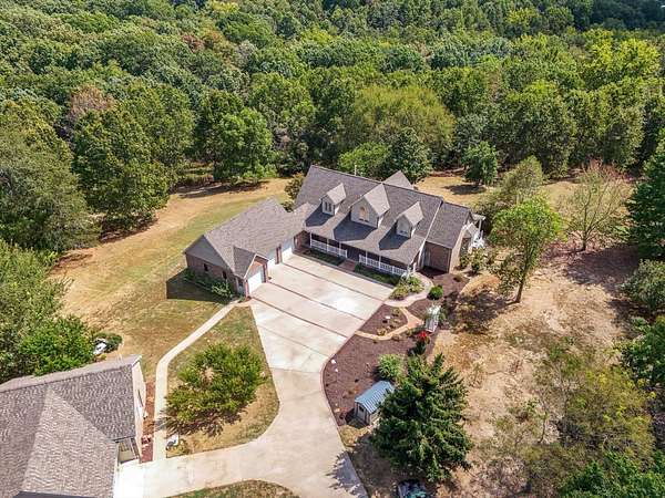 11.3 Acres of Land with Home for Sale in Nixa, Missouri