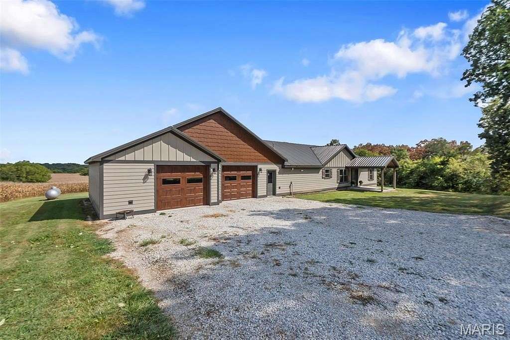 145 Acres of Land with Home for Sale in Perryville, Missouri