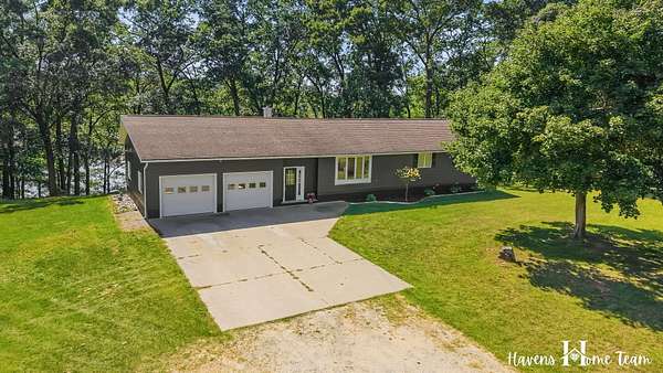 40 Acres of Recreational Land with Home for Sale in Twin Lake, Michigan