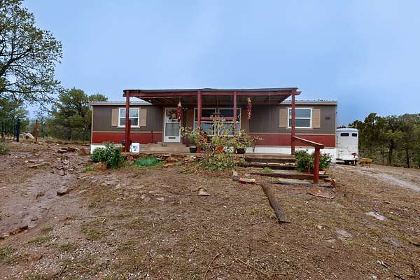 5 Acres of Land with Home for Sale in San Jose, New Mexico