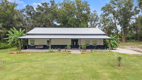10 Acres of Land with Home for Sale in Chiefland, Florida