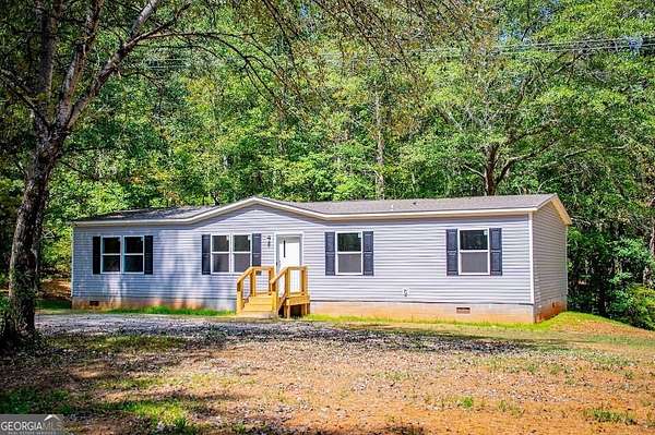 1.5 Acres of Land with Home for Sale in Carrollton, Georgia