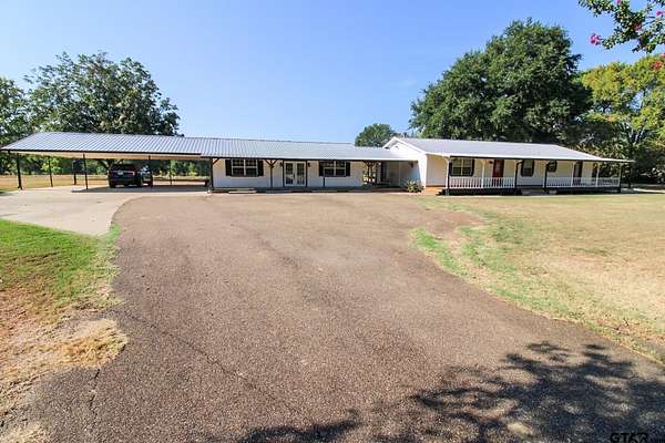 13.1 Acres of Recreational Land with Home for Sale in Mount Pleasant, Texas