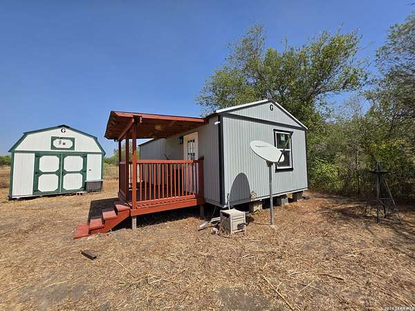 2 Acres of Land with Home for Lease in Devine, Texas