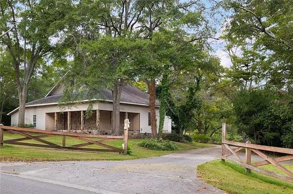 9.5 Acres of Land with Home for Sale in Powder Springs, Georgia